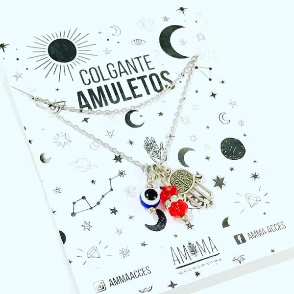 Colgante de acero quirúrgico con ojo turco, manito de hamsa y cristales de roca $950