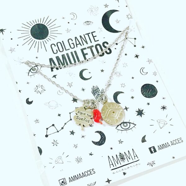 Colgante de acero quirúrgico con dije Trébol "sigue tus sueños", medalla ojo turco y cuernito $950