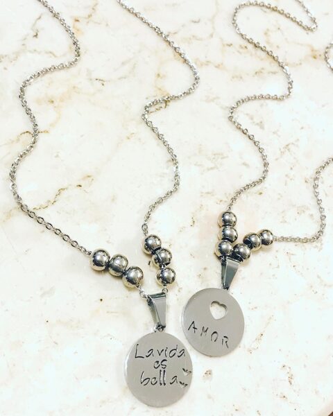 Colgante de acero quirúrgico $880