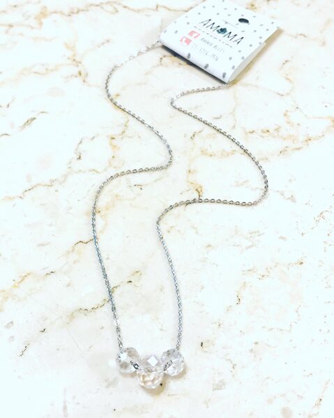 Colgante de acero quirúrgico con cristales de roca $880