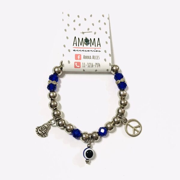 Pulsera PROTECTORA en cristales de roca con ojo turco, buda y símbolo de la paz $480
