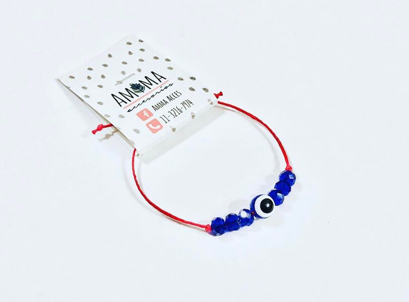Pulsera hilo rojo con cristales de roca azul y ojo turco $420
